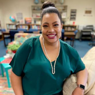 Sophilia McTyre Smiling and Posing For A Photo