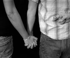Couple holding hands