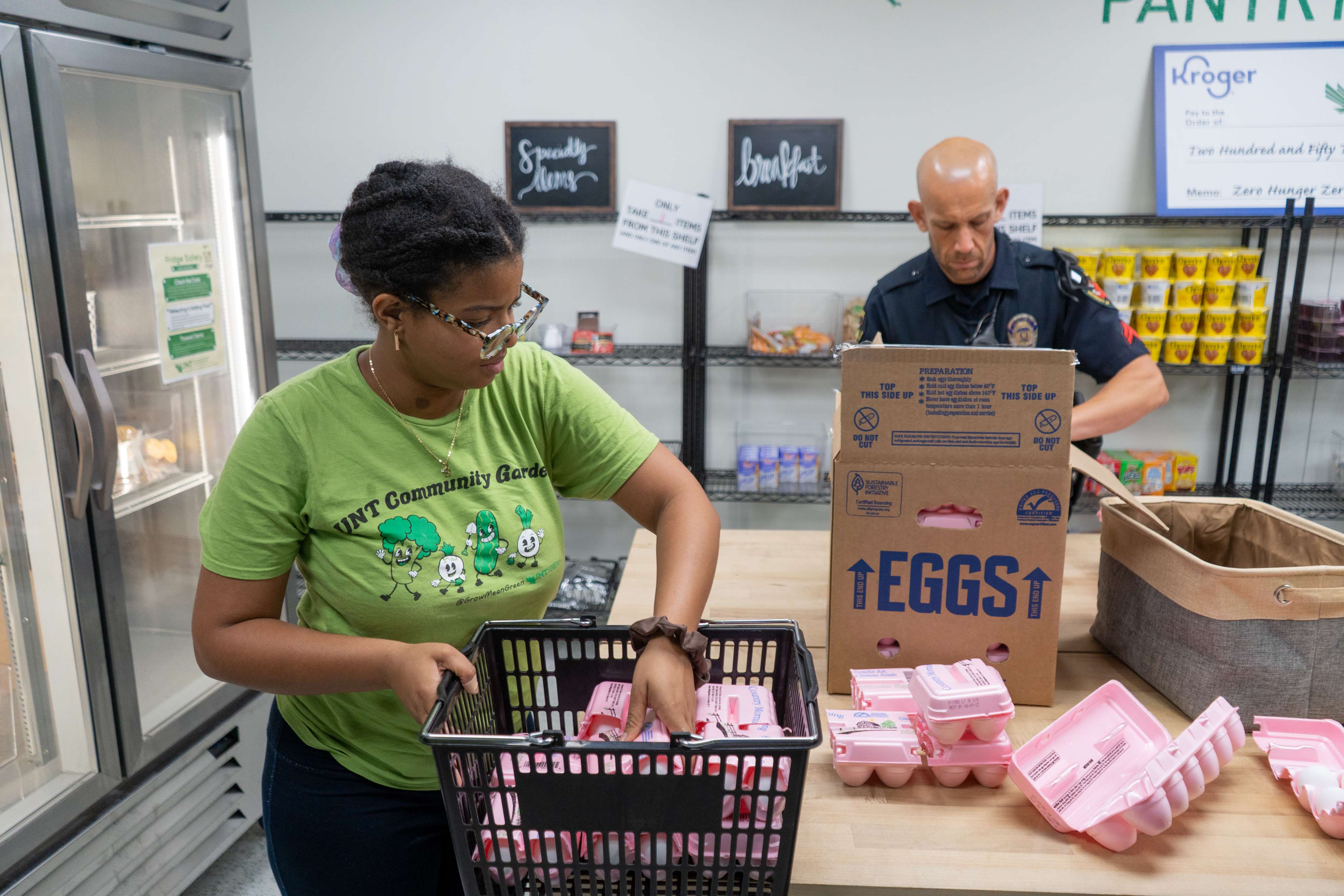 Student sorting eggs for the food pantry.