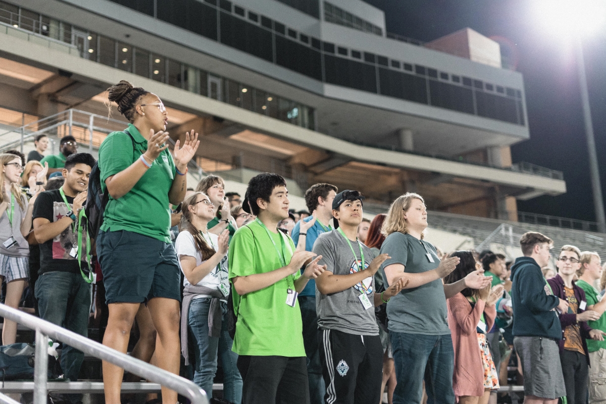 People cheering in the Apogee stadium