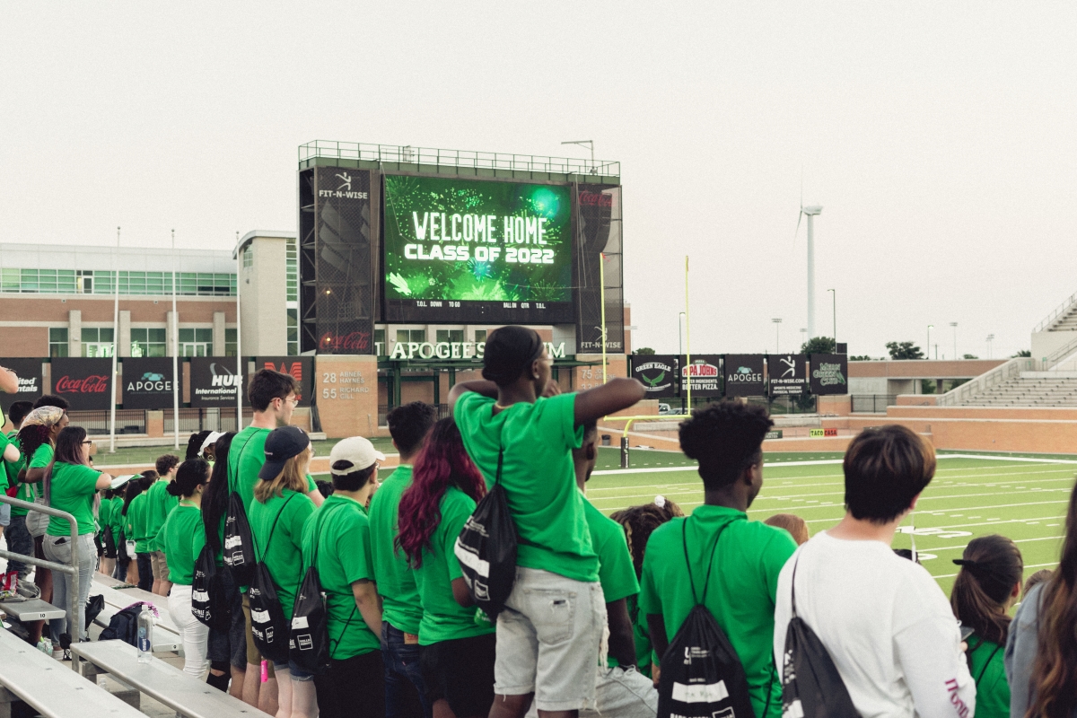 Apogee stadium with students in it
